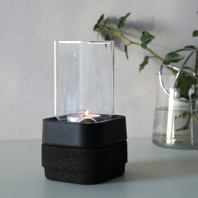 Smakfull design i praktisk ljusstake med vindskydd